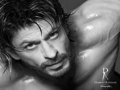 
      
      Shah Rukh Khan poses shirtless for Dabboo Ratnani's 2021...
      
      