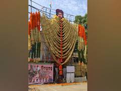 
      
      Fans garland cut-out of Chiranjeevi as 'Sye Raa Narasimha...
      
      