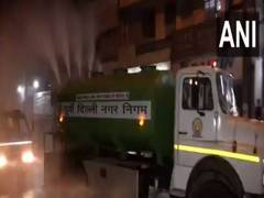 
      
      Delhi: EDMC sprinkles water on roads to reduce dust,...
      
      