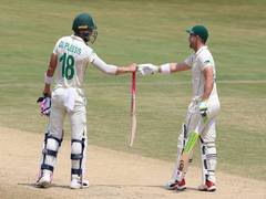 
      
      Vizag Test: Elgar, de Kock script South Africa's fightback on...
      
      