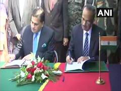 
      
      India, Pak sign agreement on Kartarpur corridor
      
      
