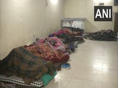 
      
      Homeless take refuge in night shelters as Delhi reels under...
      
      