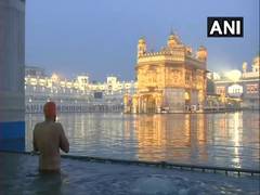 
      
      Amritsar: Devotees offer prayers at Golden Temple on Guru...
      
      
