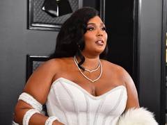 
      
      Lizzo slays Grammys red carpet in an all-white ensemble
      
      