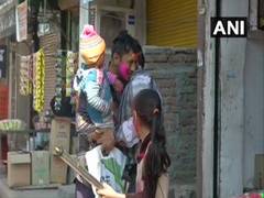 
      
      Holi celebrations in Delhi's riots-affected Maujpur
      
      