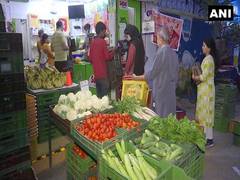 
      
      Customers in Patparganj practice social distancing while...
      
      