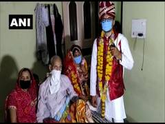 
      
      Madhya Pradesh couple ties knot observing social distancing norms
      
      