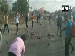 
      
      Migrants damage vehicles in Rajkot following wrong...
      
      