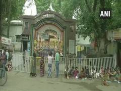
      
      Devotees offer prayers outside Ranchi's Pahari Mandir as...
      
      