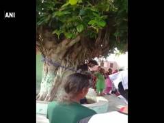 
      
      Punjab: Man tied to tree, thrashed, garlanded with shoes at...
      
      