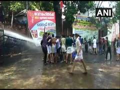 
      
      Kerala Police use water cannons to disperse protestors...
      
      