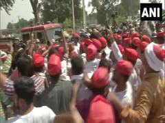 
      
      Samajwadi party workers protest in Hathras demanding justice...
      
      