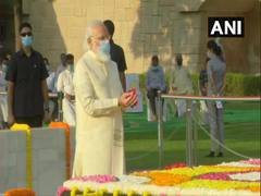 
      
      PM Modi pays tribute to Mahatma Gandhi at Raj Ghat
      
      