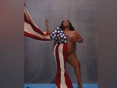 
      
      Lizzo poses nude with American flag  in her US Election Day...
      
      