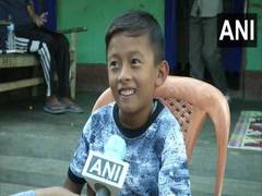 
      
      Class four student Kunal Shrestha plays football with single...
      
      