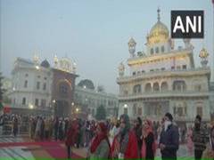 
      
      Devotees offer prayers at Golden Temple on Guru Nanak Jayanti
      
      