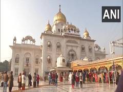 
      
      Devotees offer prayers at Delhi's Bangla Sahib Gurudwara on...
      
      