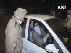 
      
      Police check vehicles of commuters in Amritsar during night curfew
      
      