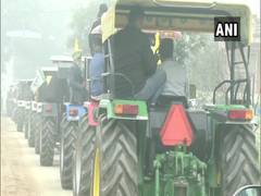 
      
      Police urge farmers to shift R-Day tractor rally to KMP...
      
      