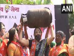 
      
      Maharashtra: Shiv Sena workers hold protest  against rising...
      
      