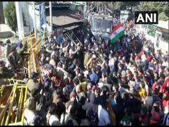 
      
      Protestors march towards U'khand Assembly pelt stones at...
      
      