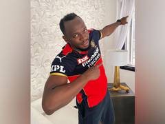 
      
      Bolt in RCB jersey cheers for the team ahead of IPL
      
      