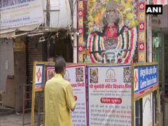 
      
      Mumbai: Devotees pray outside Mumba Devi Temple on Ashtami...
      
      