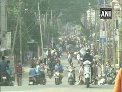 
      
      Large number of people flock to grocery shops in Karnataka...
      
      