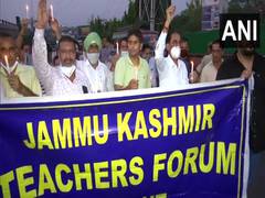 
      
      J-K: Teachers forum holds candle march against killings of...
      
      