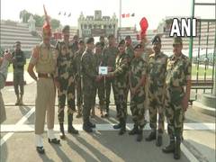 
      
      BSF, Pakistan Rangers exchange sweets at Attari-Wagah border...
      
      
