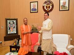 
      
      Pushkar Singh Dhami meets Yogi Adityanath, discusses pending...
      
      