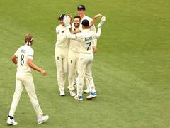 
      
      Wood's maiden Ashes five-fer keeps England's hope alive in...
      
      