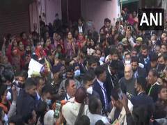 
      
      UP Assembly polls: Amit Shah holds door-to-door campaign in...
      
      
