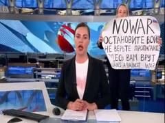 
      
      Russian state TV interrupted by "no war" protest: Report
      
      