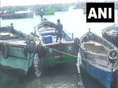 
      
      Sri Lankan navy apprehends 12 Indian fishermen, impounds one boat
      
      