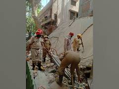 
      
      Under-construction building in Delhi's Satya Niketan collapses
      
      