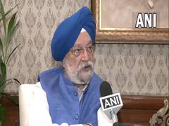 
      
      'Centre would be happy to bring petrol, diesel under GST'
      
      