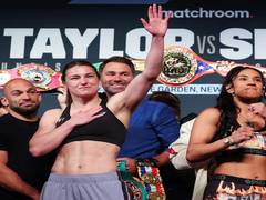 
      
      Katie Taylor retains lightweight world title in historic bout
      
      