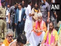 
      
      J-K LG participates in 'Navgrah Ashtamangalam Pooja' in Anantnag
      
      