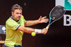 
      
      Stan Wawrinka notches win to signal comeback after injury
      
      