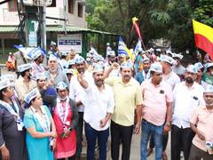 
      
      Bengaluru: AAP protests against poor construction of stadium
      
      