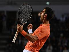 
      
      Djokovic downs Auger-Aliassime to set semi-final clash with Ruud
      
      