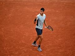 
      
      Spain's Carlos Alcaraz defeats Sebastian Korda
      
      