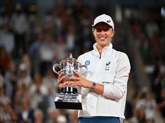 
      
      French Open champion Swiatek finds calm in Nadal's perspective
      
      