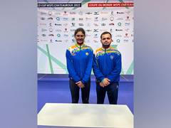 
      
      Manish Narwal, Rubina Francis clinch air pistol mixed team gold
      
      
