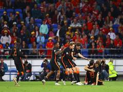
      
      Weghorst's late winner helps Netherlands edge Wales
      
      