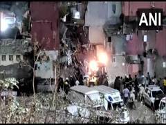 
      
      Residential building collapses in Mumbai's Shastri Nagar
      
      