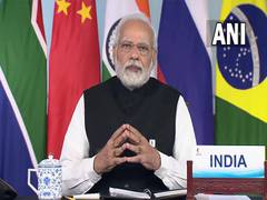 
      
      PM Modi at BRICS: Cooperation can help global post-COVID recovery
      
      