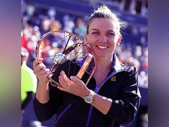 
      
      Halep battles past Haddad Maia to claim Toronto title
      
      