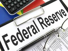 
      
      US Fed Reserve keeps policy rates steady, ignoring Trump's...
      
      